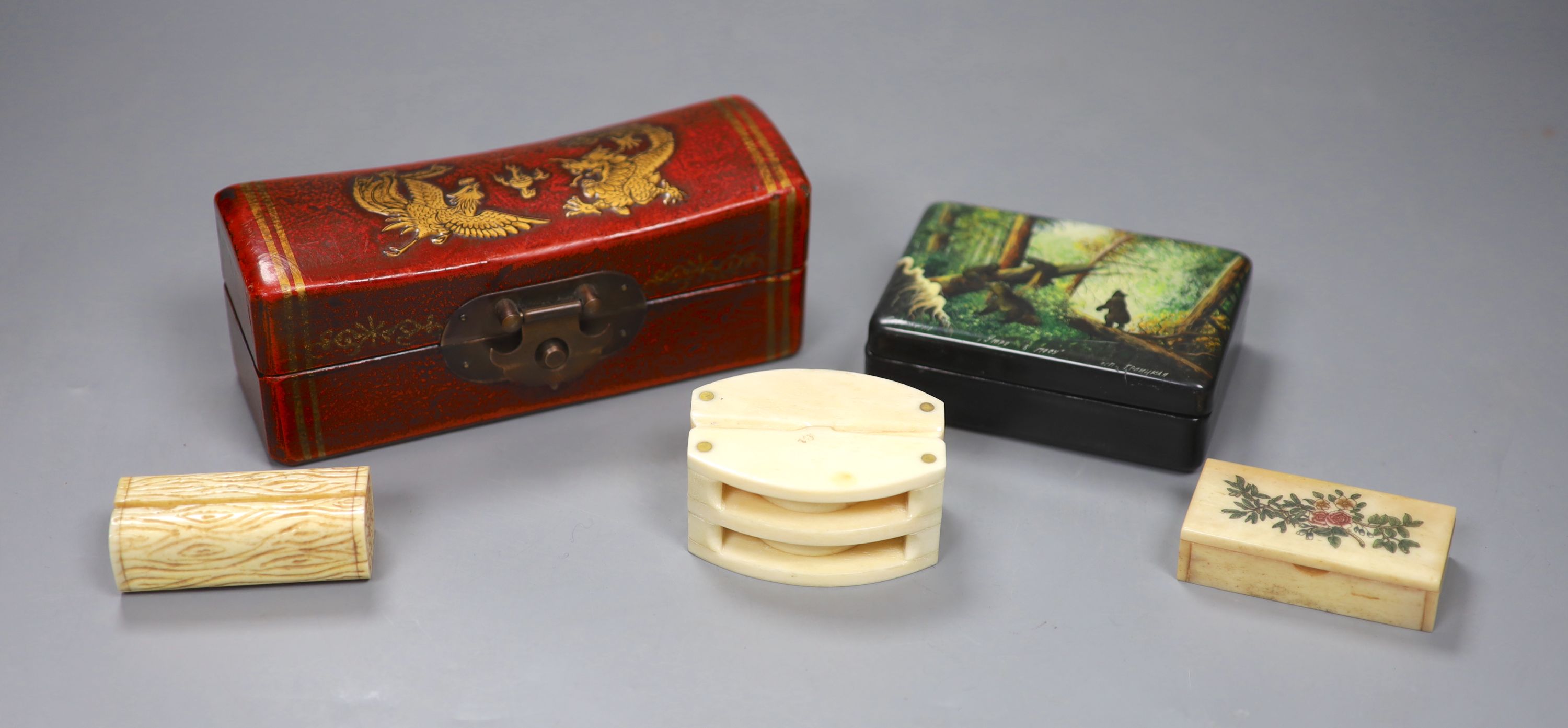 A Russian papier mache box, 10 x 7cm, and three other boxes